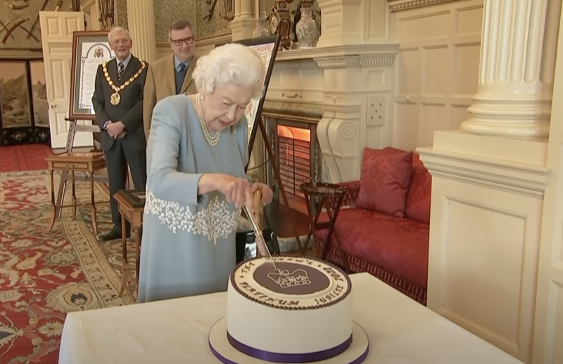 Royal Family News: Queen Elizabeth Cuts Her Cake and Cracks the Room Up