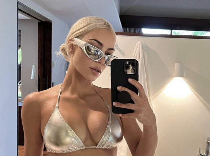 Kim Kardashian Shows Off 21-Pound Weight Loss In Bikini, Denies Plastic Surgery