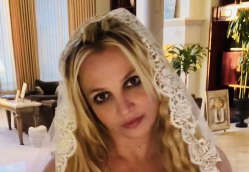 Britney Spears SHOCKS Instagram By Holding Lighter Near Her Tongue!