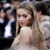 Rita Ora Rocks A Backless Nearly Nude Dress For Her Pre-Grammy Party In LA