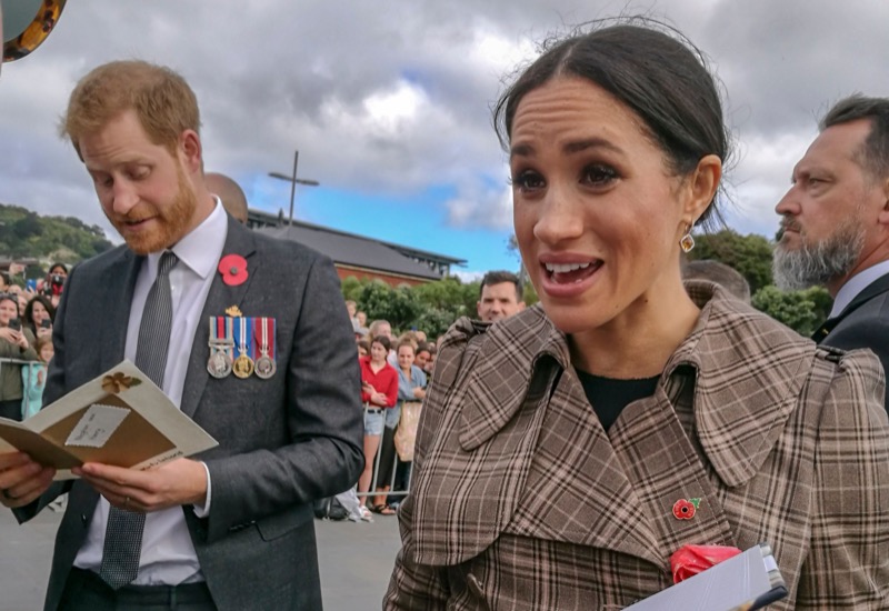 Prince Harry And Meghan Markle Are Feeling The ‘Bum Rush’ As King Charles Forces Them Into Exile