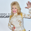 Dolly Parton Honors Loretta Lynn And Naomi Judd, Brings Goat To ACM Awards