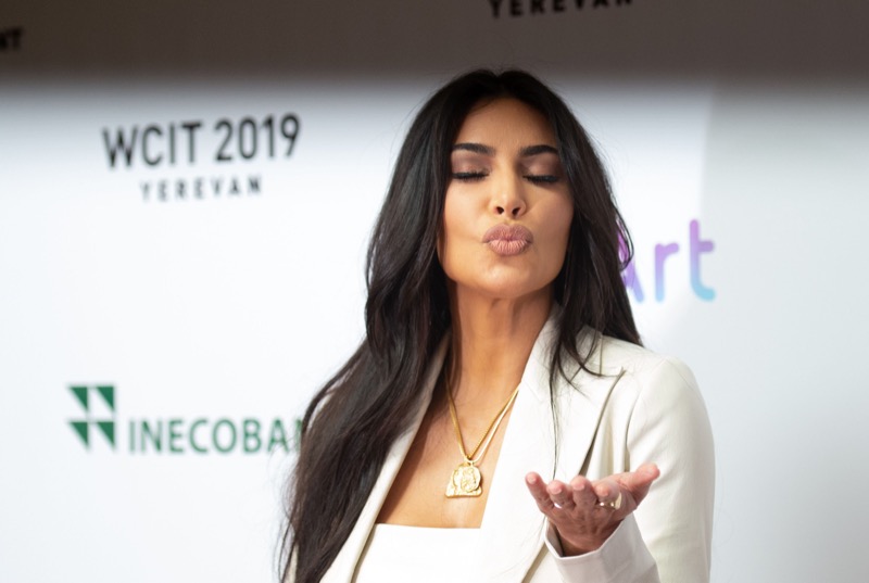 Kim Kardashian Keeps It Cute, Distracts Fans From Bad Press
