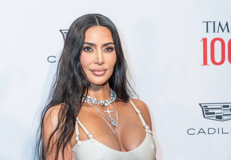 Kim Kardashian Flirts With Tom Brady During Bidding War