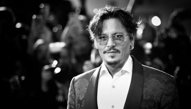 Johnny,Depp,Walks,The,Red,Carpet,Ahead,Of,The,"waiting