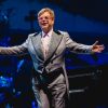 The Dark Secret Behind Elton John's Near-Fatal Attack