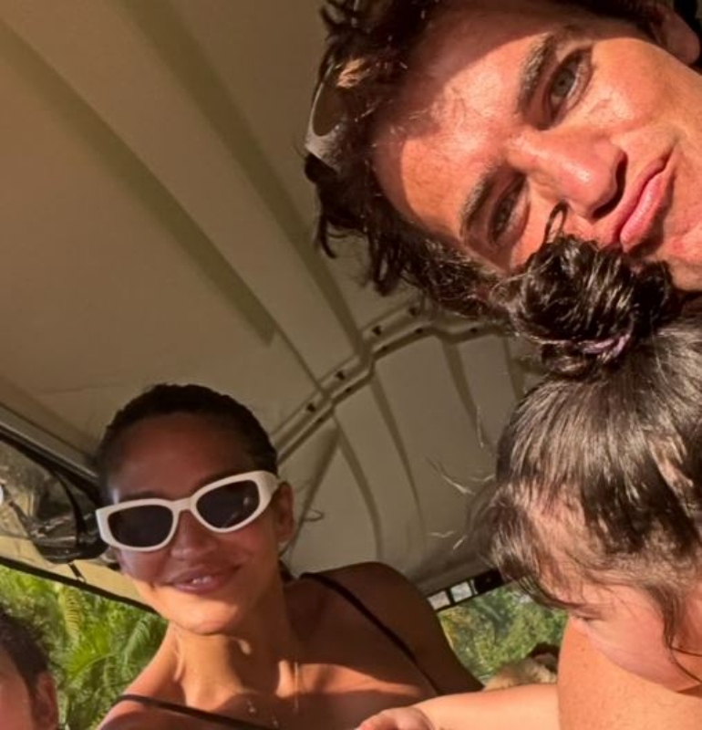 Cassie and Alex with one of their kids - @alexfine44 - Instagram