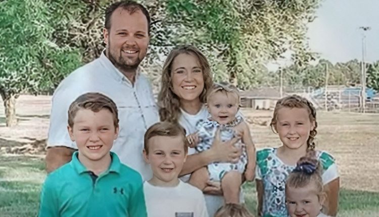 Josh with his family before he was sentenced to prison- Instagram